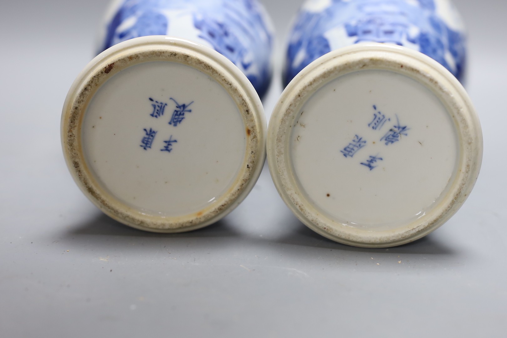 A pair of Chinese blue and white ‘boys’ baluster vases and a Chinese blue and white jar, 19th-century and later 27cm